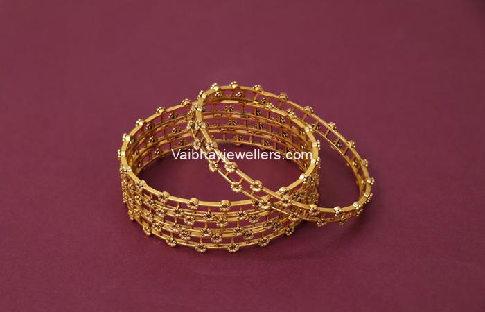 22Kt Gold Floral Design Antique Gheru 4 Set Bangles